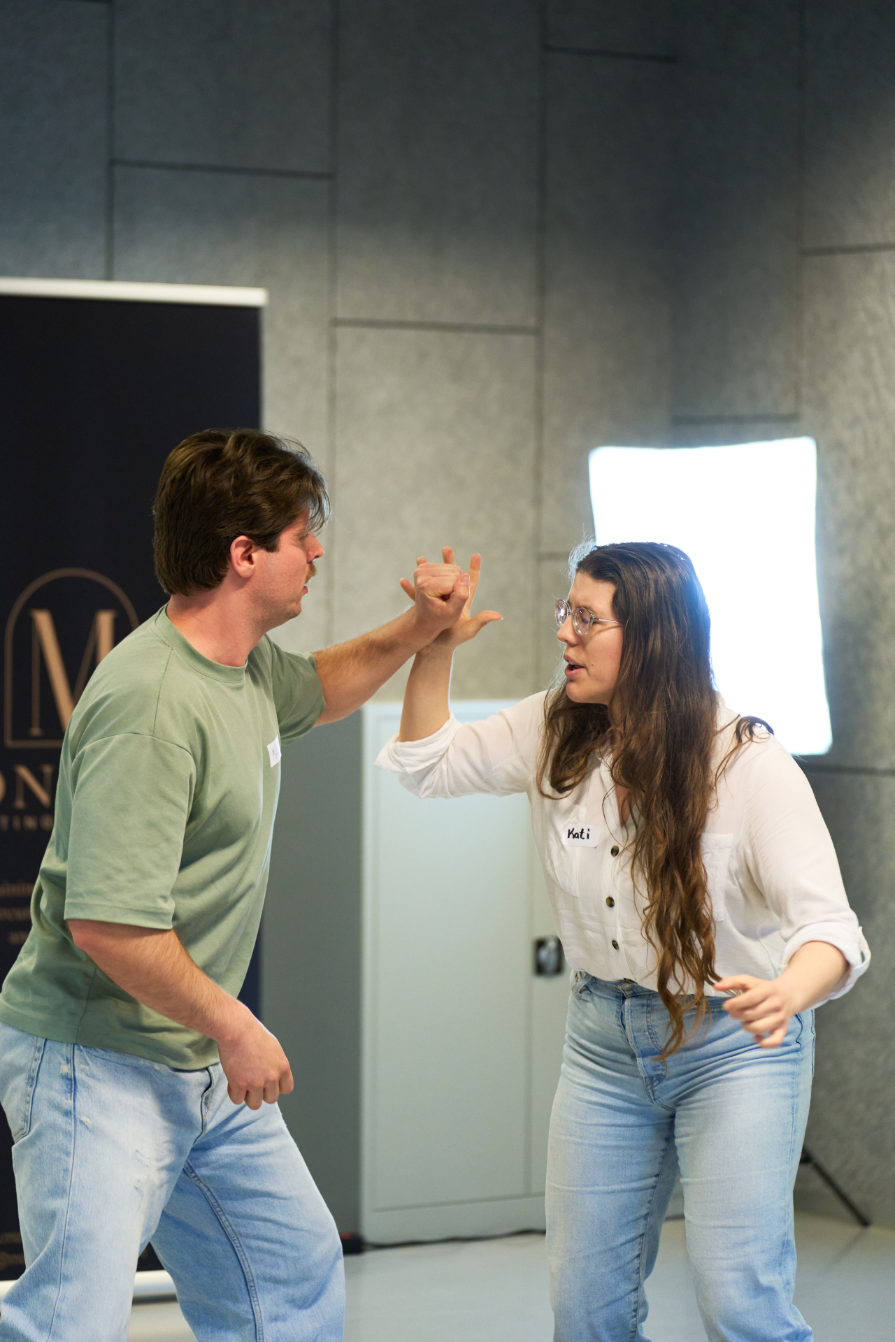 Two participants mid-scene in a Monnarc Discovery workshop